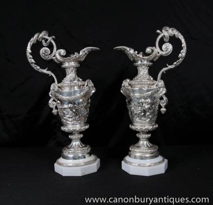 Paire victorienne plat argenté Cherub cruches Vases Urnes Sheffield Paire victorienne plat argenté Cherub cruches Vases Urnes Sheffield