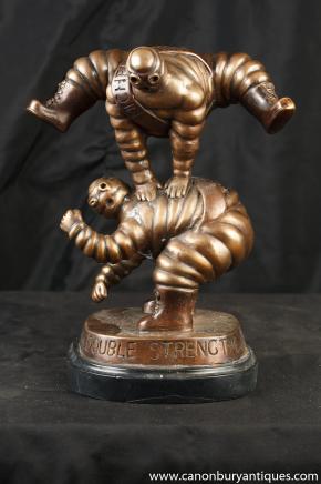 Pair French Bronze Michelin Man Jumping Bibendum Statues Figures Pair French Bronze Michelin Man Jumping Bibendum Statues Figures