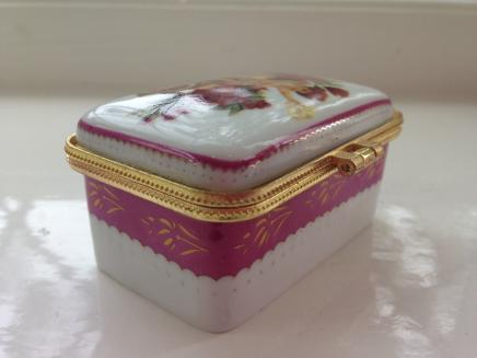 Porcelain Cherub in Rose Cart Trinket